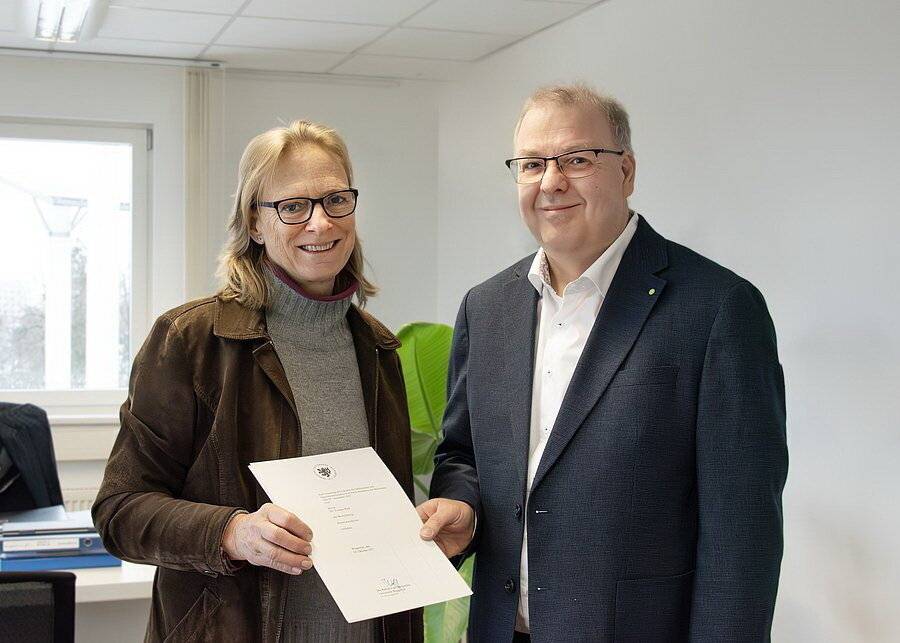 Uni-Rektorin Prof. Dr. Birgitta Wolff und Dr. Torsten Wolf. 