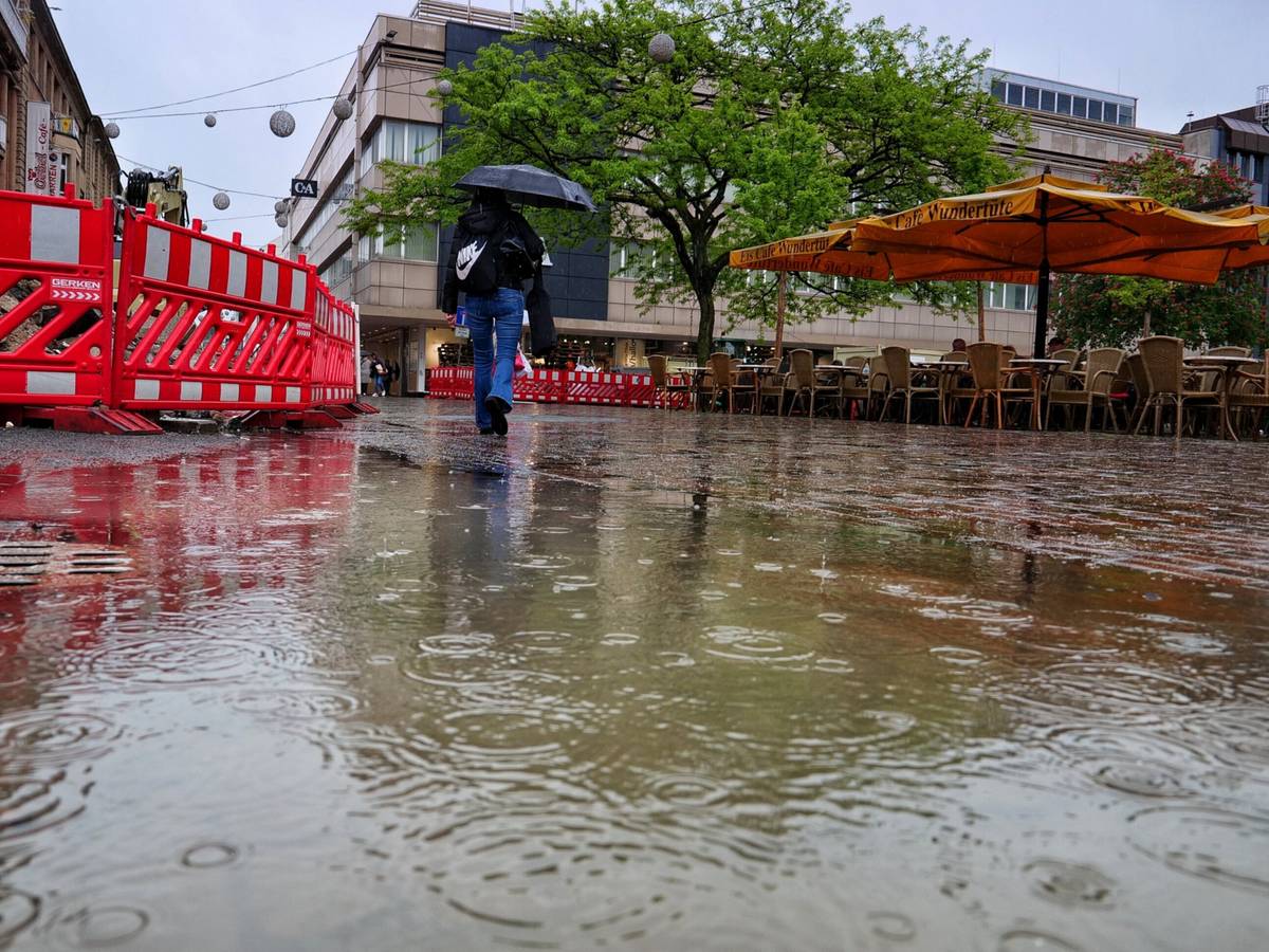 Barmen im Regen